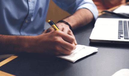 A man following 5 simple steps at a desk to apply for a BDO Credit Card.