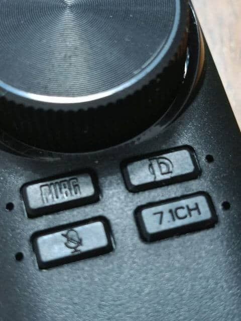A close up of the buttons on a remote control. Keywords: remote control, buttons