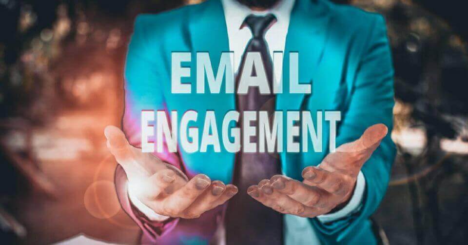 A man in a suit showcasing email engagement for beginners and SMEs.