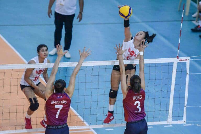 Female volleyball players, block.