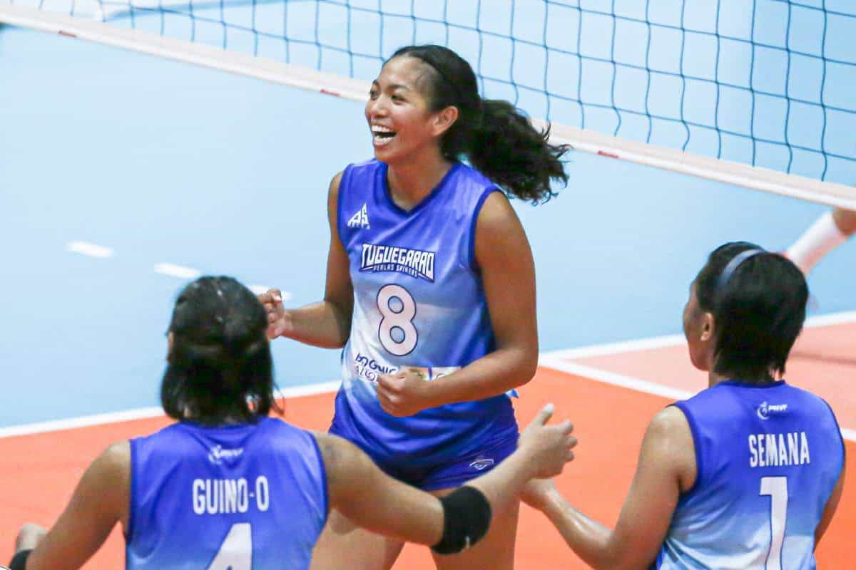 A group of female former Perlas Spikers celebrate a goal, having found a new home in PLDT.
