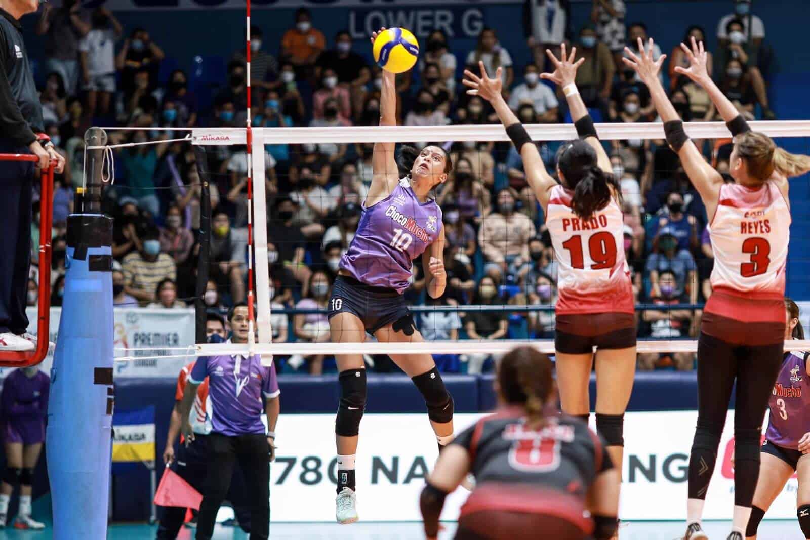 A group of female volleyball players edge PLDT in a thrilling five-set match to move on to PVL semis.