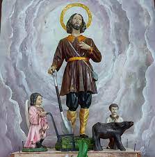 A statue of Jesus in a church, with no connection to San Isidro Labrador or his Feast Day.