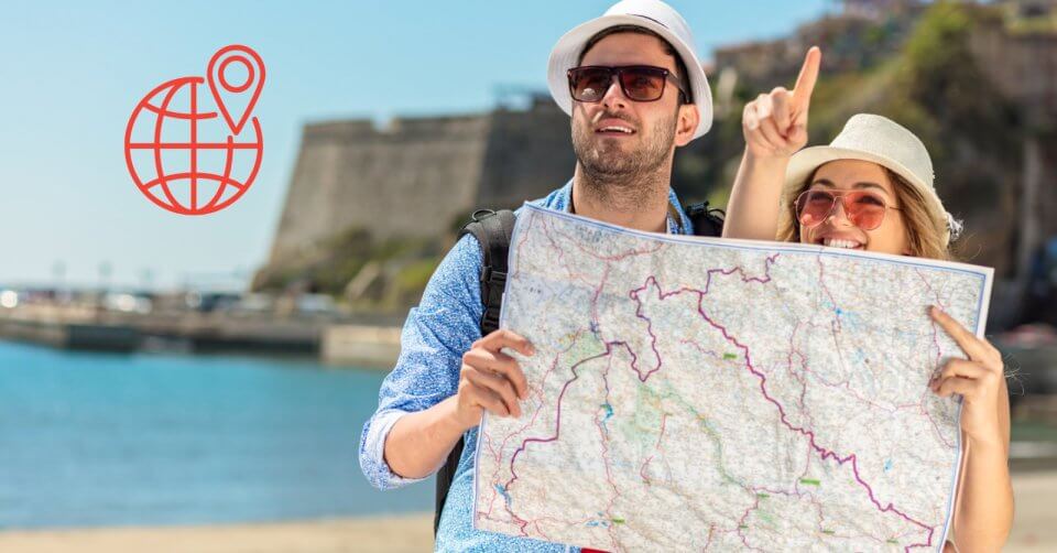 a couple pointing to the ocean, becoming google local guides.