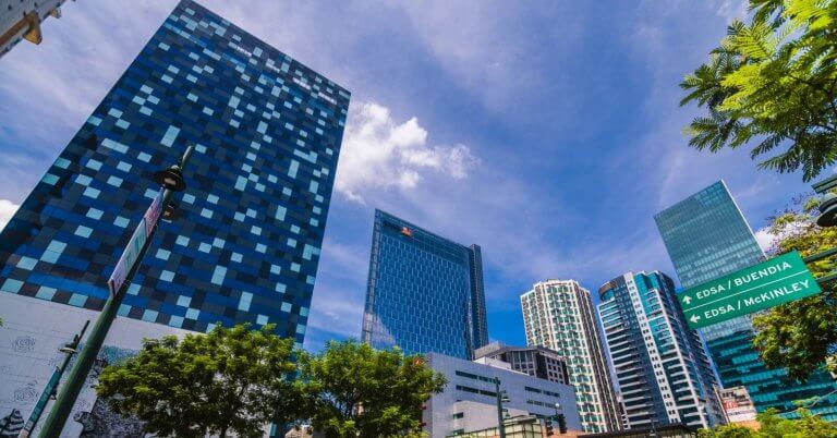 The skyline of BGC with top condominiums and trees.
