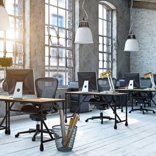 A top coworking space in Metro Manila with many desks and chairs.