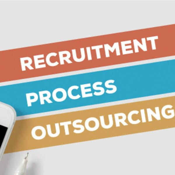 A smartphone and pen sit beside horizontal bars labeled Recruitment, Process, and Outsourcing on a white background, evoking the synergy of BPO operations in dynamic hubs like Bonifacio Global City.