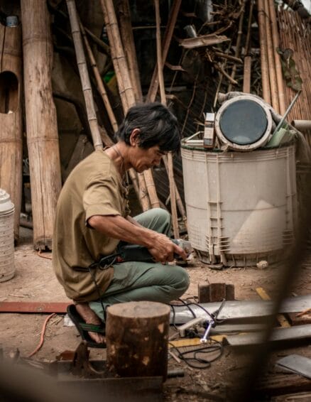Appliance repair technician servicing a unit — the exact scenario an extended warranty in the Philippines is meant to cover