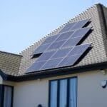 Rows of solar panels installed on a residential roof, illustrating the home rooftop solar setup discussed in this Philippines cost and payback guide
