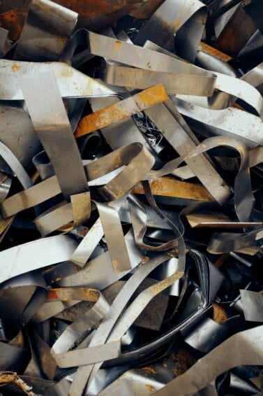 Pile of sorted scrap metal at a junk shop, the kind of load weighed and priced per kilo by junk shops in the Philippines