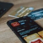 Shopping on the AliExpress app on a smartphone — one of the cross-border platforms, alongside Temu and Shein, that Filipino shoppers weigh against Shopee and Lazada