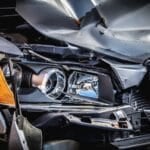 Damaged car with a crushed front hood and broken headlight — the kind of own-vehicle collision damage CTPL does not cover in the Philippines, which is why comprehensive car insurance exists