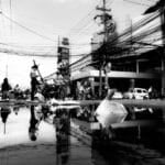 Flooded residential street in Lapu-Lapu City, Cebu, Philippines after a typhoon, the kind of calamity that automatically triggers DTI's price freeze on basic necessities