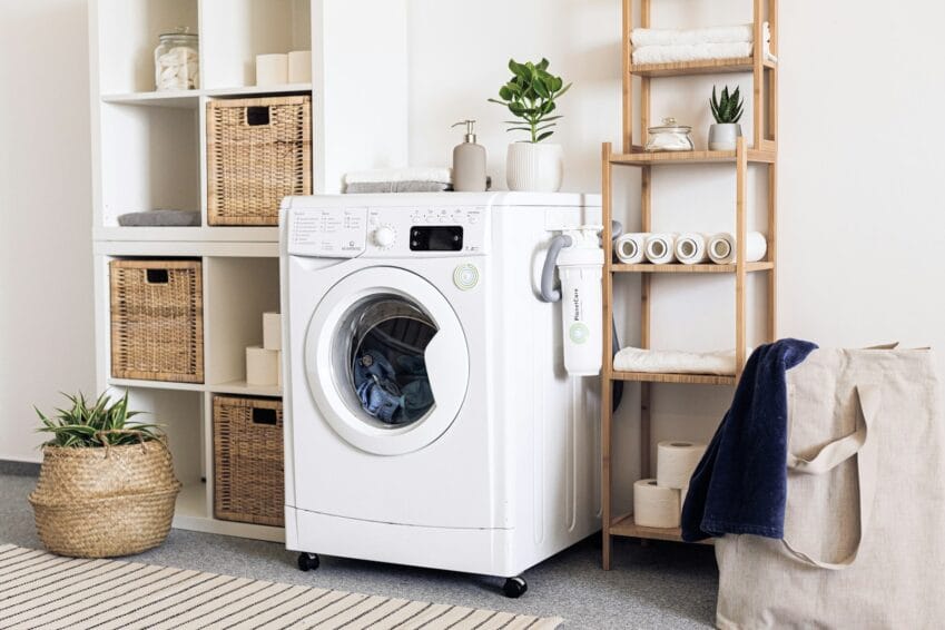 Close-up of a white front-loading clothes dryer drum door, the type of vented or condenser tumble dryer covered in this Philippine buying guide