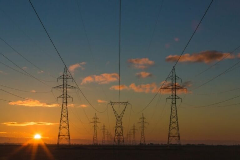 Electrical transmission towers carrying power lines on the Luzon grid, whose thinning reserves trigger the NGCP red alerts behind Philippine rotating brownouts