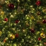 A fully decorated artificial Christmas tree with ornaments, illustrating the budget-to-premium price tiers covered in this Philippines buying guide