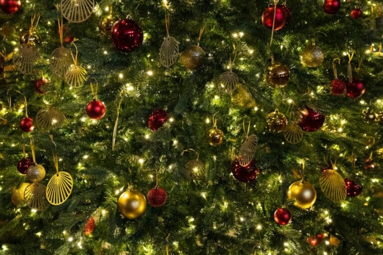 A fully decorated artificial Christmas tree with ornaments, illustrating the budget-to-premium price tiers covered in this Philippines buying guide