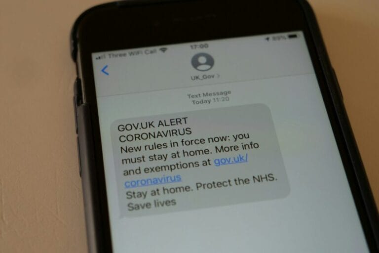 Smartphone screen showing a text message, representing the fake courier delivery SMS scams circulating in the Philippines in 2026