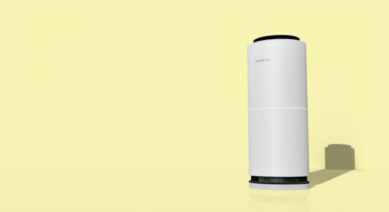 White cylindrical HEPA air purifier running in a home, the kind of unit covered in this guide to whether an air purifier is worth buying in the Philippines