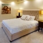 Mattress-in-a-Box vs. Traditional Mattress: Which Is Actually Sulit in the Philippines? (2026 Buying Guide) A bare foam mattress on a bed frame, illustrating the mattress-in-a-box versus traditional mattress comparison for Filipino buyers