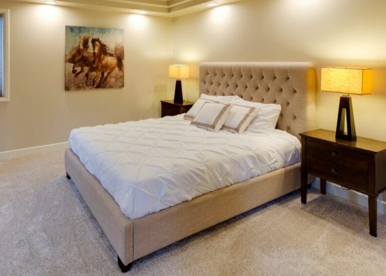 A bare foam mattress on a bed frame, illustrating the mattress-in-a-box versus traditional mattress comparison for Filipino buyers