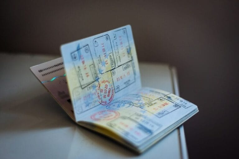 Open passport covered in visa stamps, representing the DFA passport renewal process at the center of this fixer guide