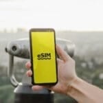 Smartphone screen showing an eSIM digital interface during setup, illustrating how Globe, Smart, and DITO subscribers activate an eSIM in the Philippines